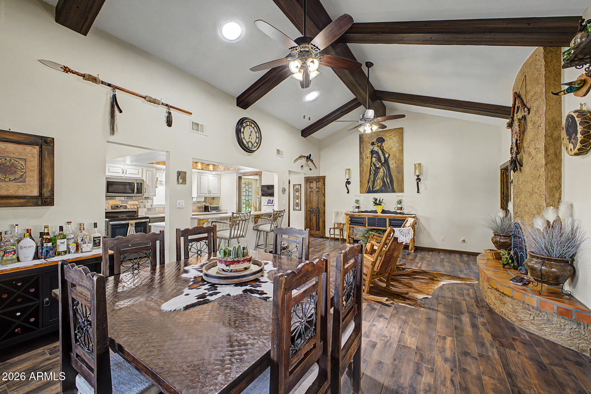 18722 East Rio Lane Rio Verde, AZ 85263 - Photo 7 of 55 a view of a dining room with furniture and a chandelier
