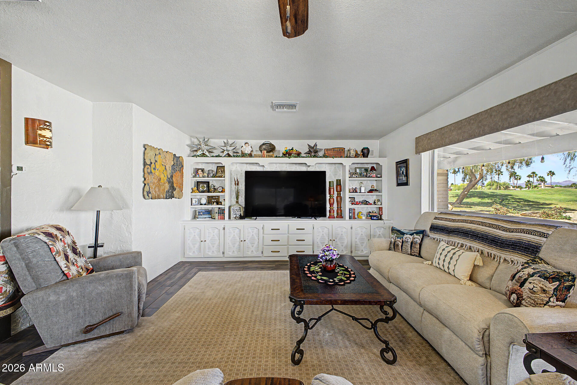 18722 East Rio Lane Rio Verde, AZ 85263 - Photo 10 of 55 a living room with furniture and a flat screen tv