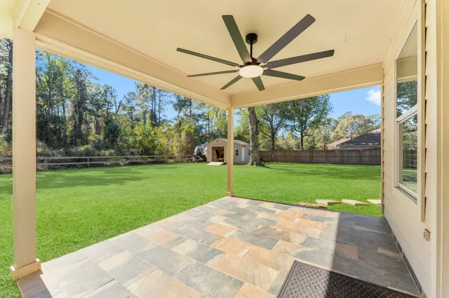 a view of a porch with a big yard