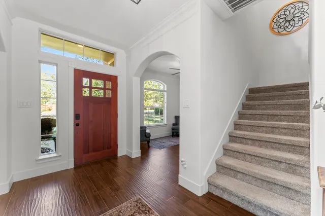a view of entryway with wooden floor