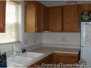 3250 Winesap Road Hope Mills, NC 28348 - Photo 8 of 9 a bathroom with a bathtub