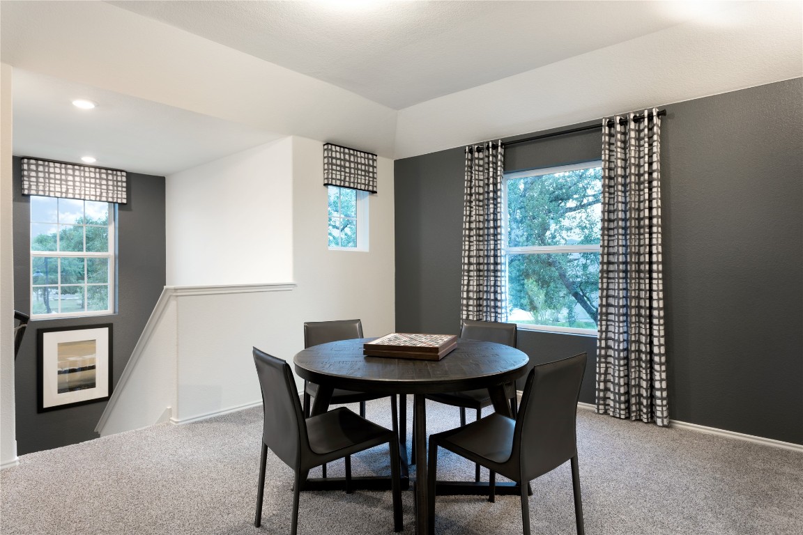 110 Sapling Dew Drive Georgetown, TX 78628 - Photo 15 of 22 a dining room with furniture and window