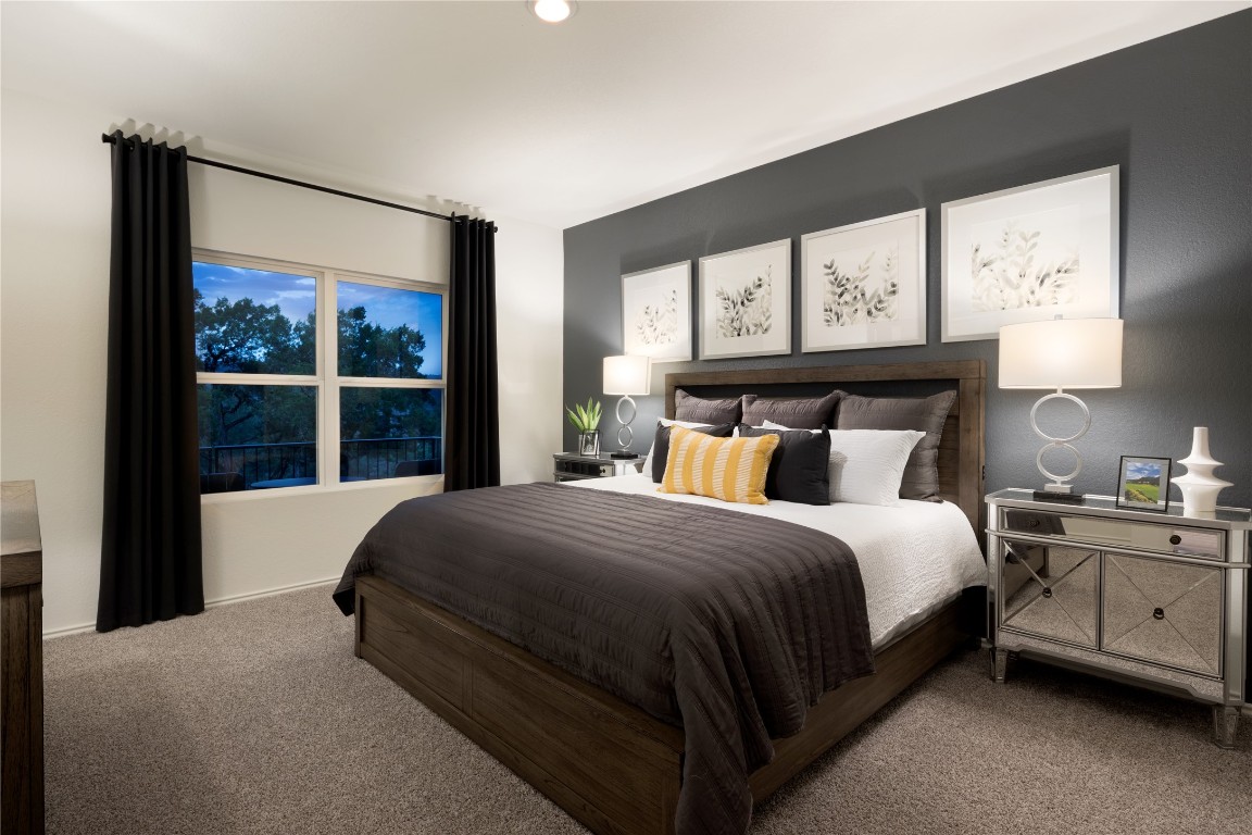 110 Sapling Dew Drive Georgetown, TX 78628 - Photo 16 of 22 a bedroom with a bed and window