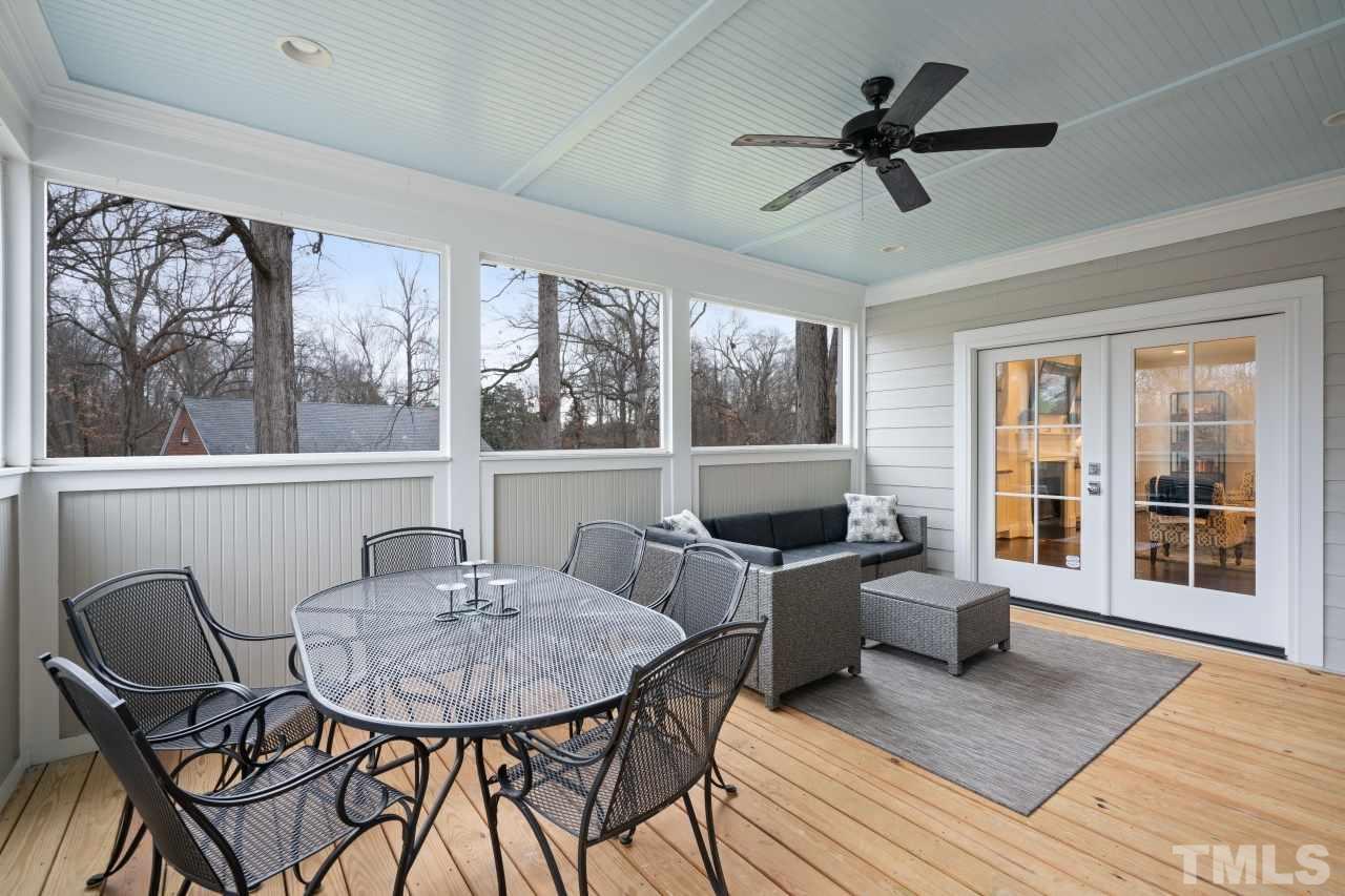 2217 Alexander Road Raleigh, NC 27608 - Photo 16 of 30 a living room with furniture and a large window