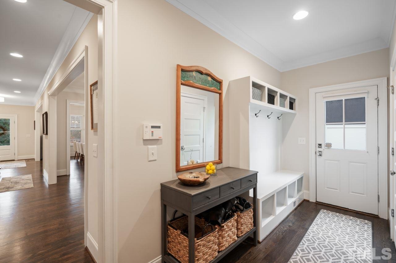 2217 Alexander Road Raleigh, NC 27608 - Photo 18 of 30 a living room with furniture and a table