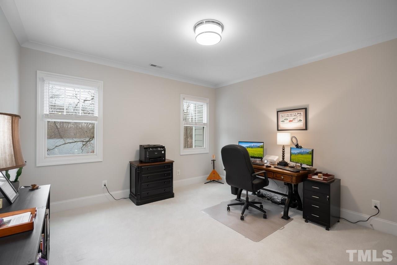 2217 Alexander Road Raleigh, NC 27608 - Photo 24 of 30 a workspace with furniture and a window