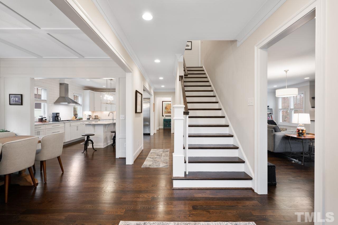 2217 Alexander Road Raleigh, NC 27608 - Photo 5 of 30 a view of entryway and hall with wooden floor