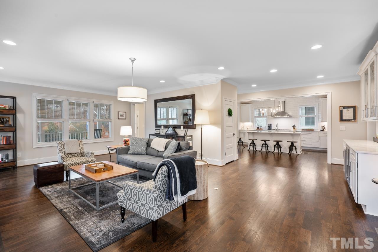2217 Alexander Road Raleigh, NC 27608 - Photo 6 of 30 a living room with furniture and wooden floor