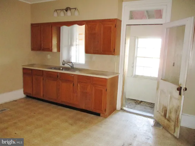 a room with a sink and a vanity