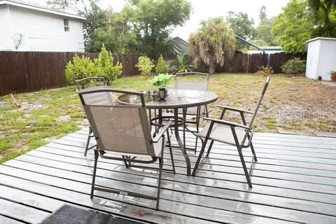 a view of a chairs and table on the terrace