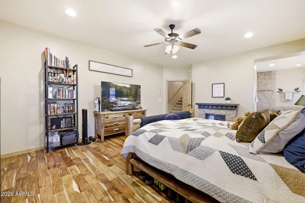 a bed room with a bed and a chandelier