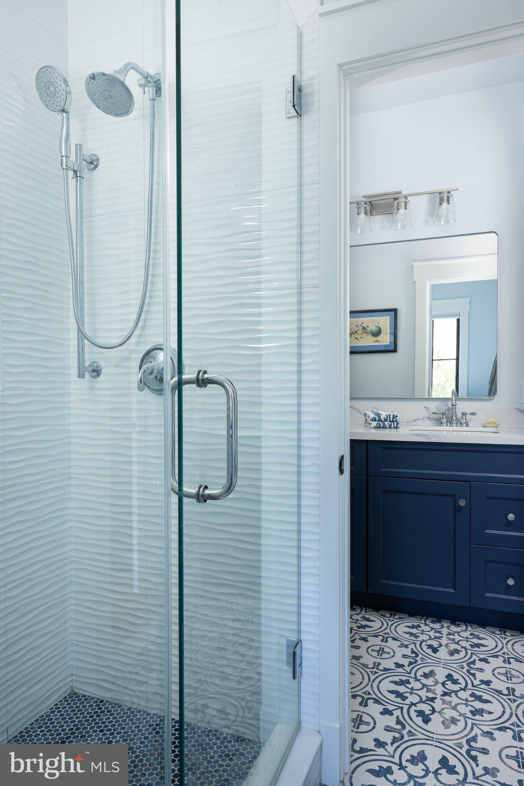 4905 16th Road North Arlington, VA 22207 - Photo 15 of 19 Sleek shower with elegant tile design.