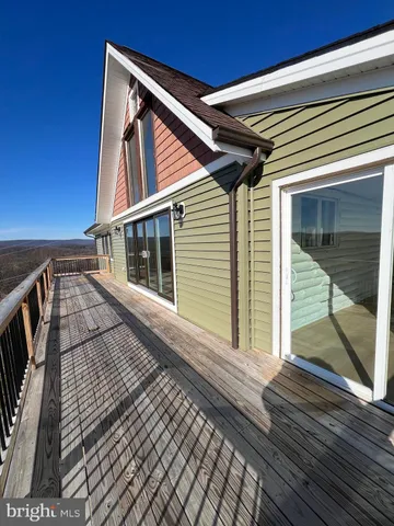 a view of a house with a large window