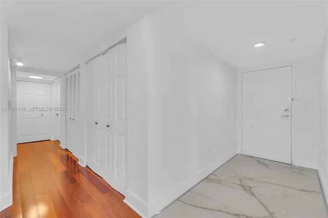 a view of hallway with shower