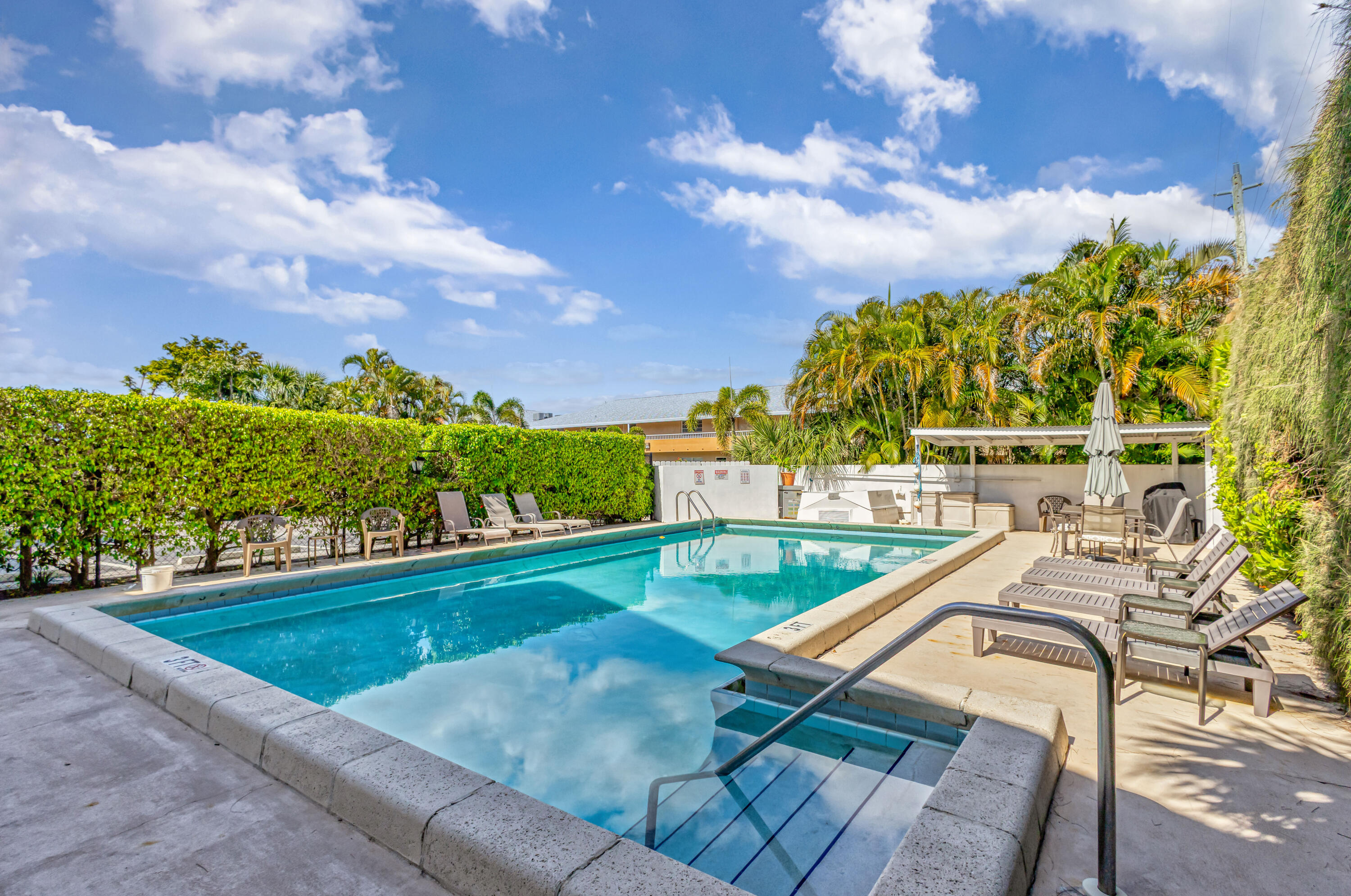 3110 Surf Way, Unit 4 Singer Island, FL 33404 - Photo 38 of 54 Private Community Pool