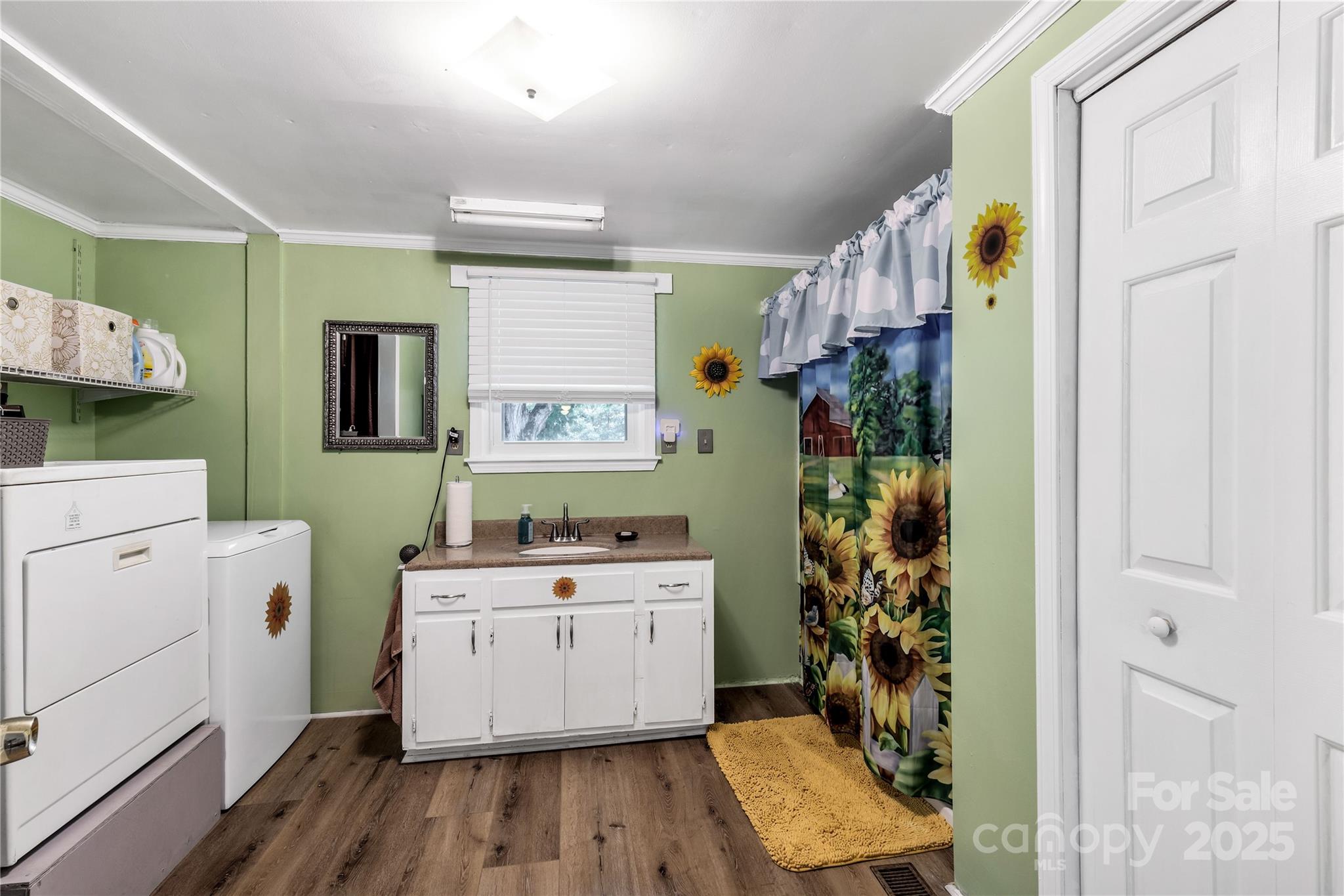 1164 Stroupe Road Lancaster, SC 29720 - Photo 14 of 37 a room with a walk in closet and wooden floor