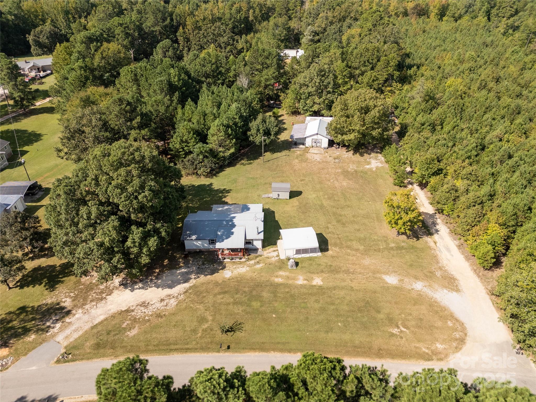 1164 Stroupe Road Lancaster, SC 29720 - Photo 2 of 37 a view of a yard with plants
