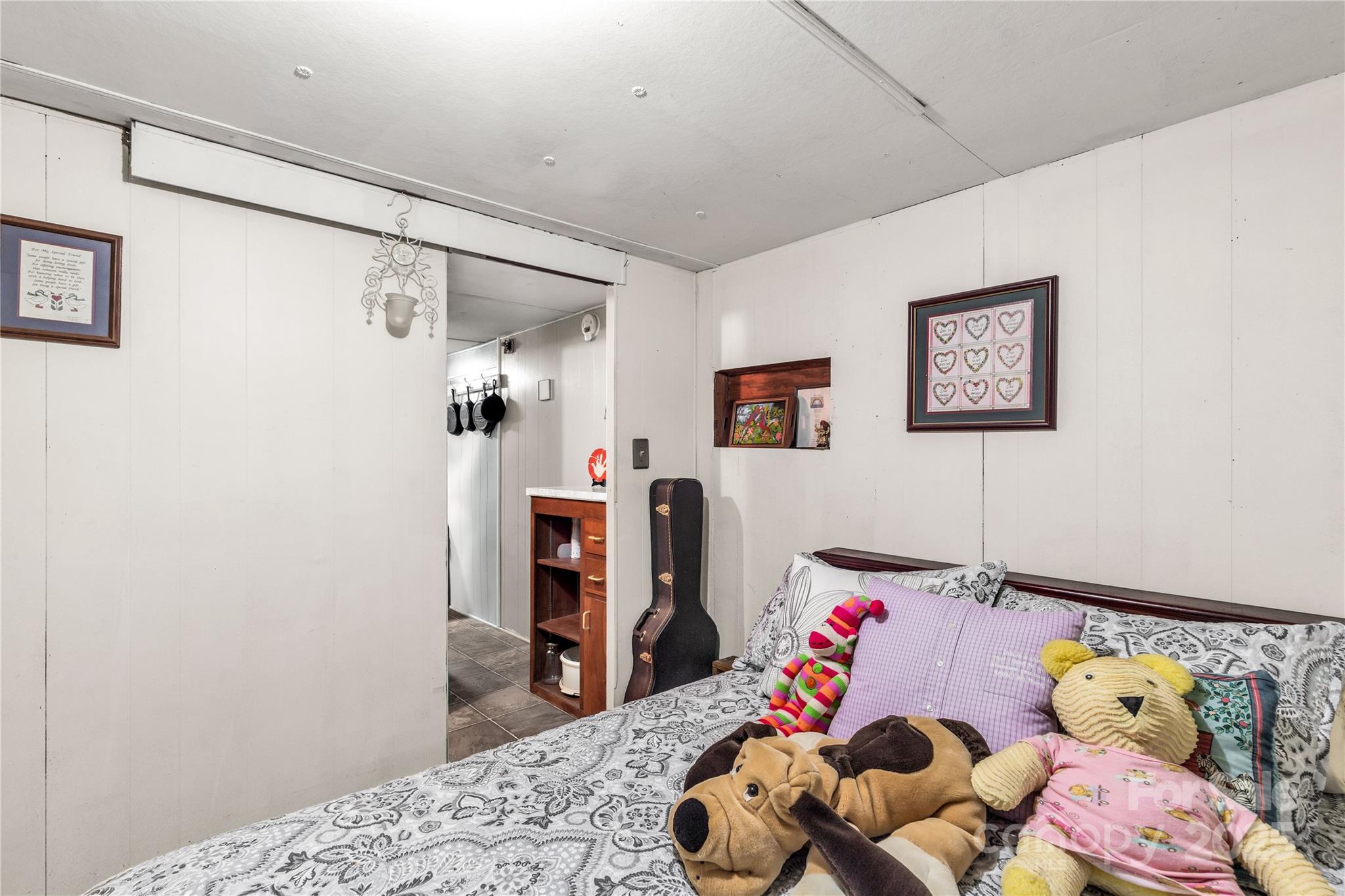 1164 Stroupe Road Lancaster, SC 29720 - Photo 21 of 37 a bedroom with a bed and closet