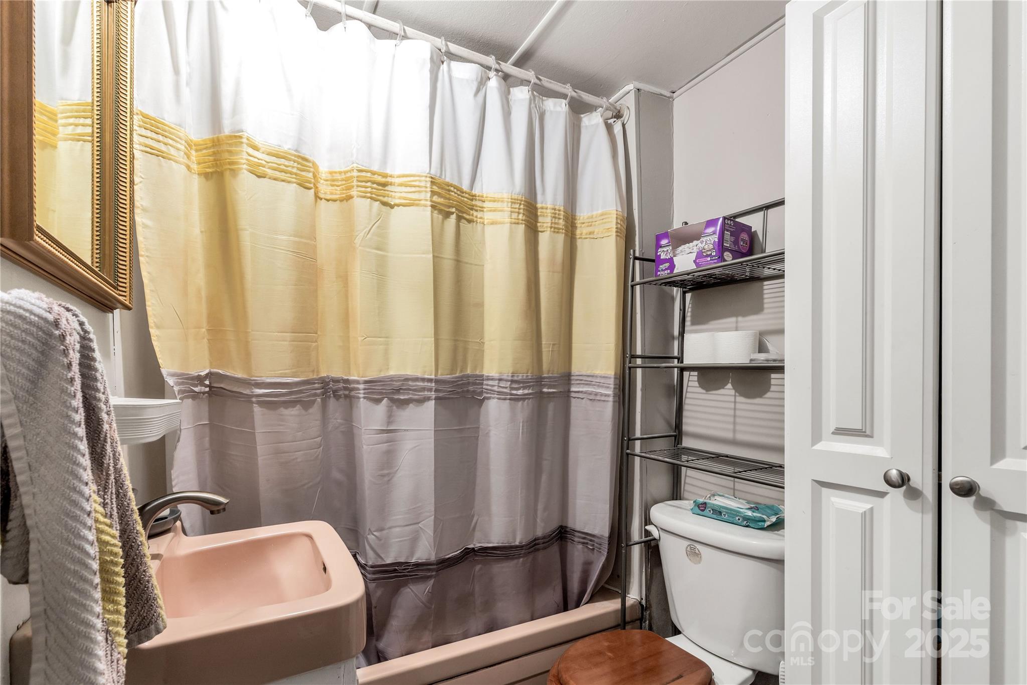 1164 Stroupe Road Lancaster, SC 29720 - Photo 22 of 37 a kitchen with a window a refrigerator and a sink