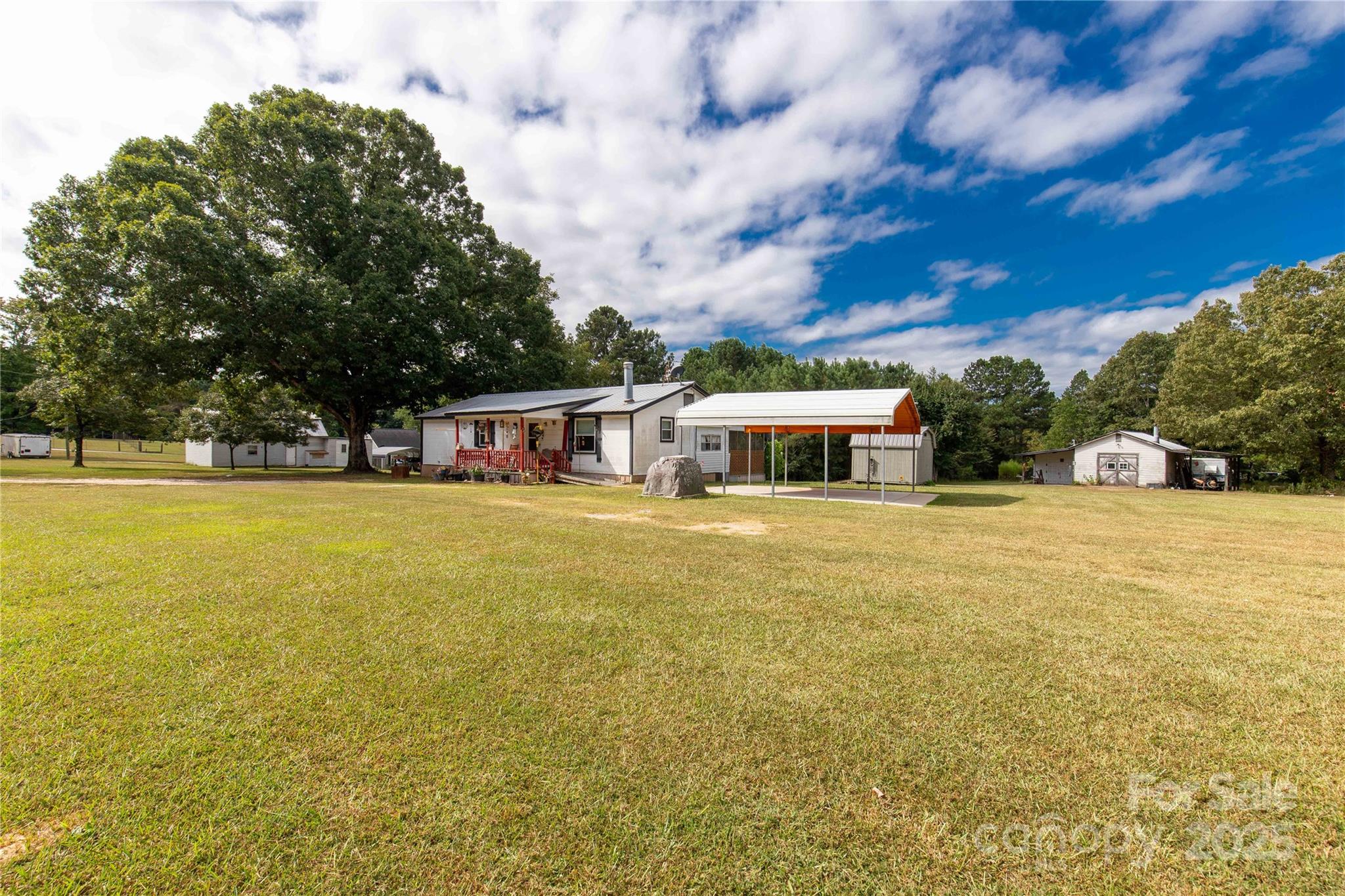 1164 Stroupe Road Lancaster, SC 29720 - Photo 26 of 37 a house view with swimming pool in front of it