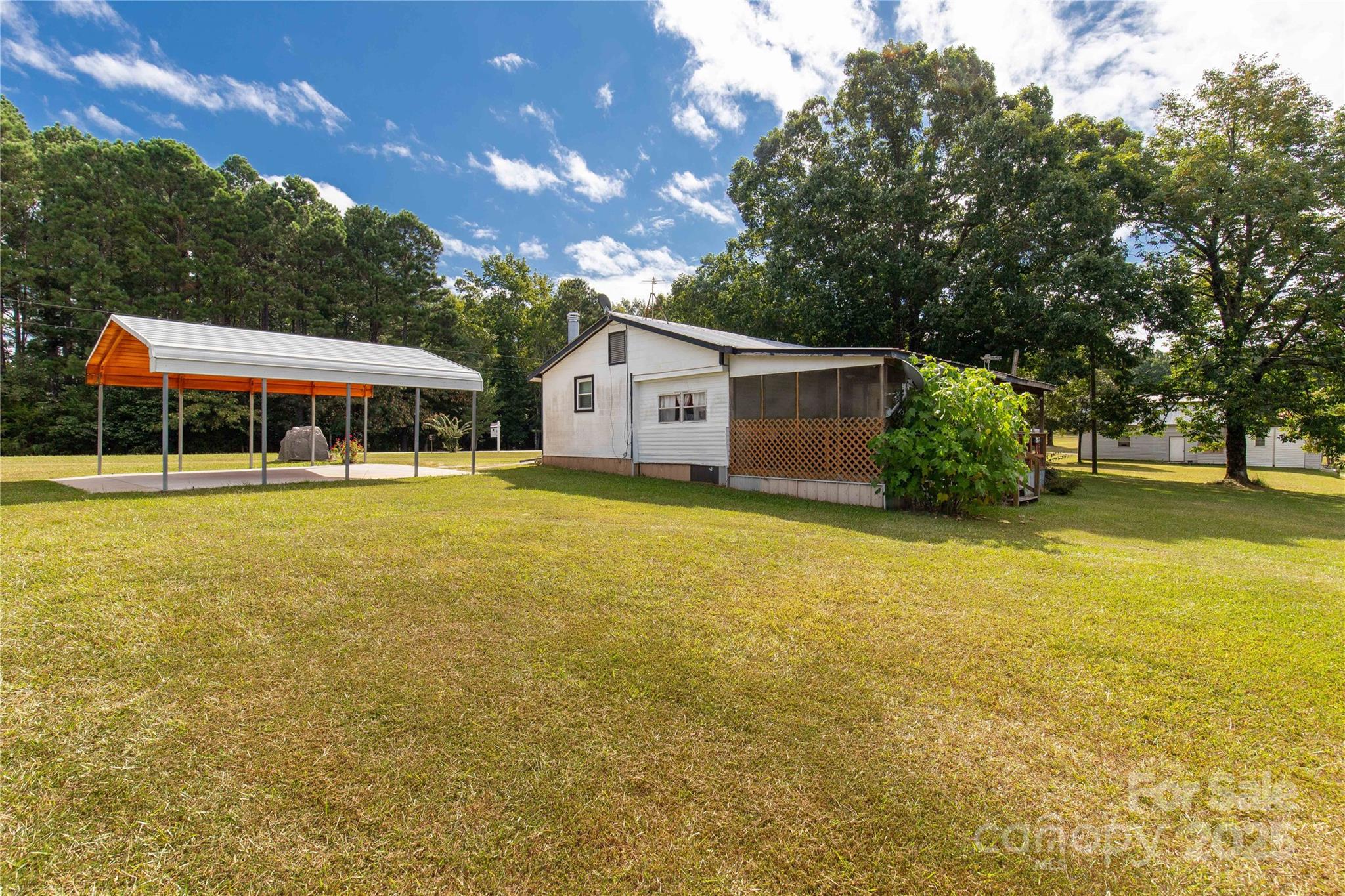 1164 Stroupe Road Lancaster, SC 29720 - Photo 31 of 37 a view of a house with a yard