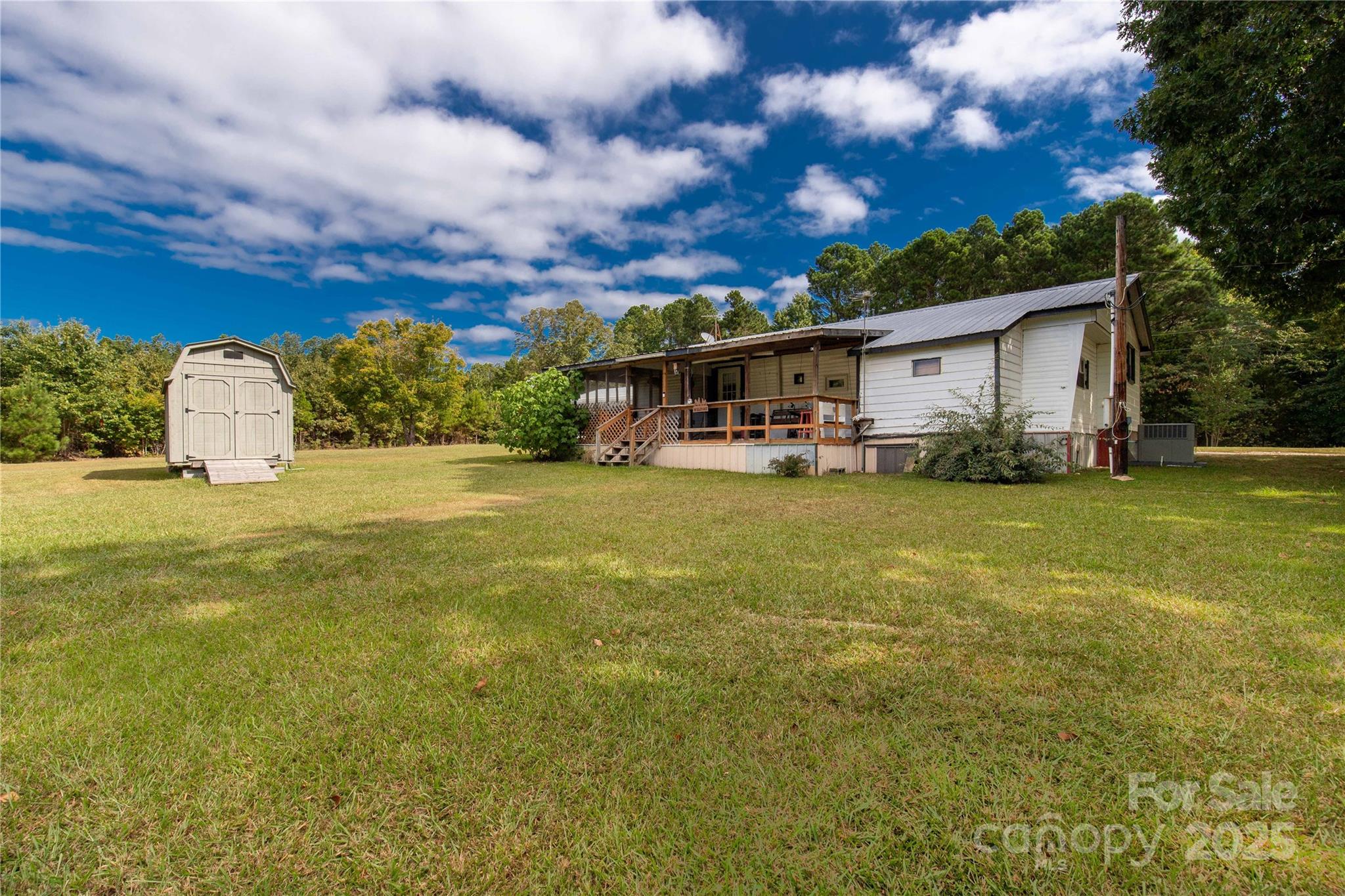 1164 Stroupe Road Lancaster, SC 29720 - Photo 32 of 37 a view of a house with a yard