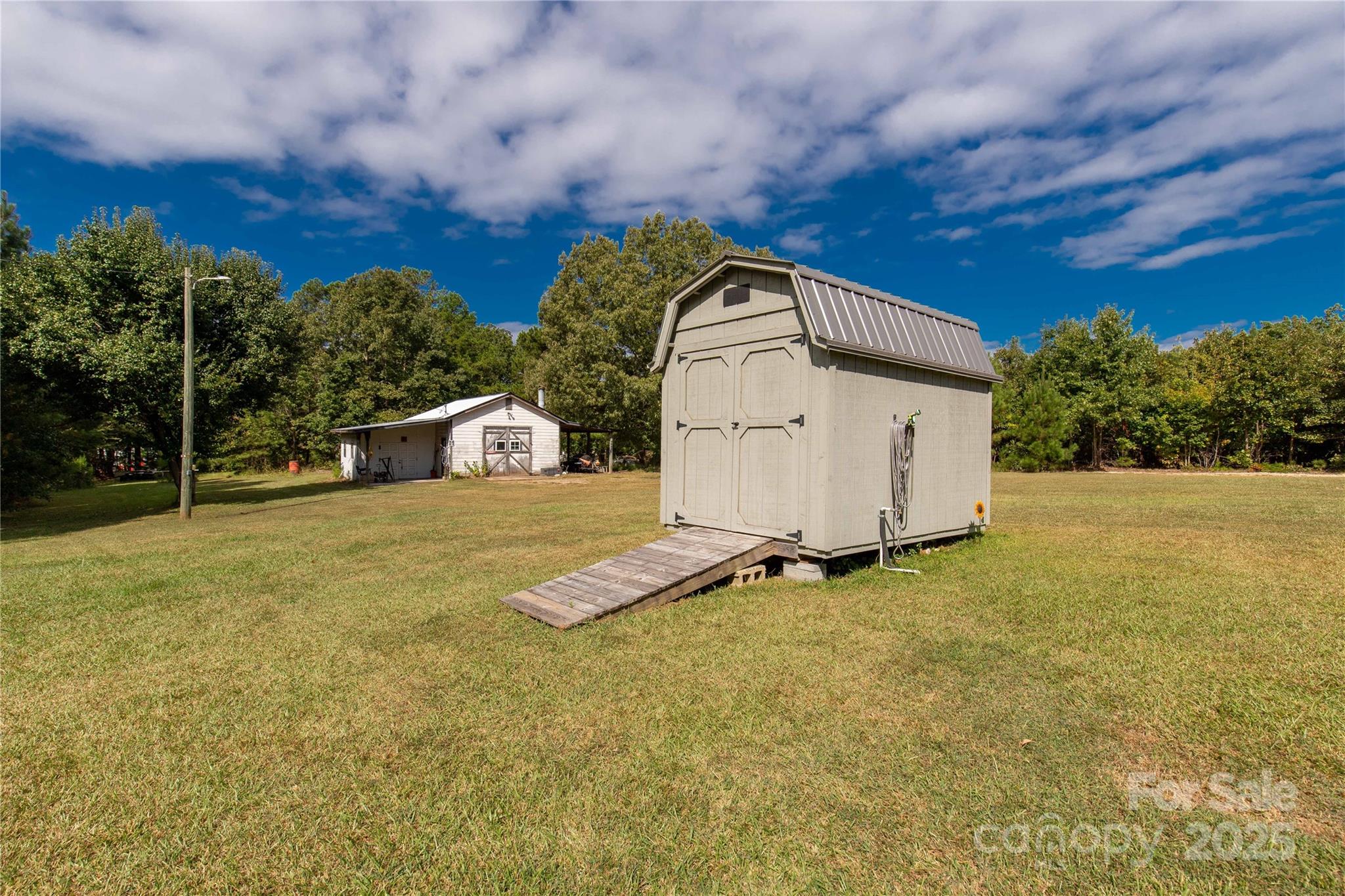 1164 Stroupe Road Lancaster, SC 29720 - Photo 34 of 37 a view of a house with a yard