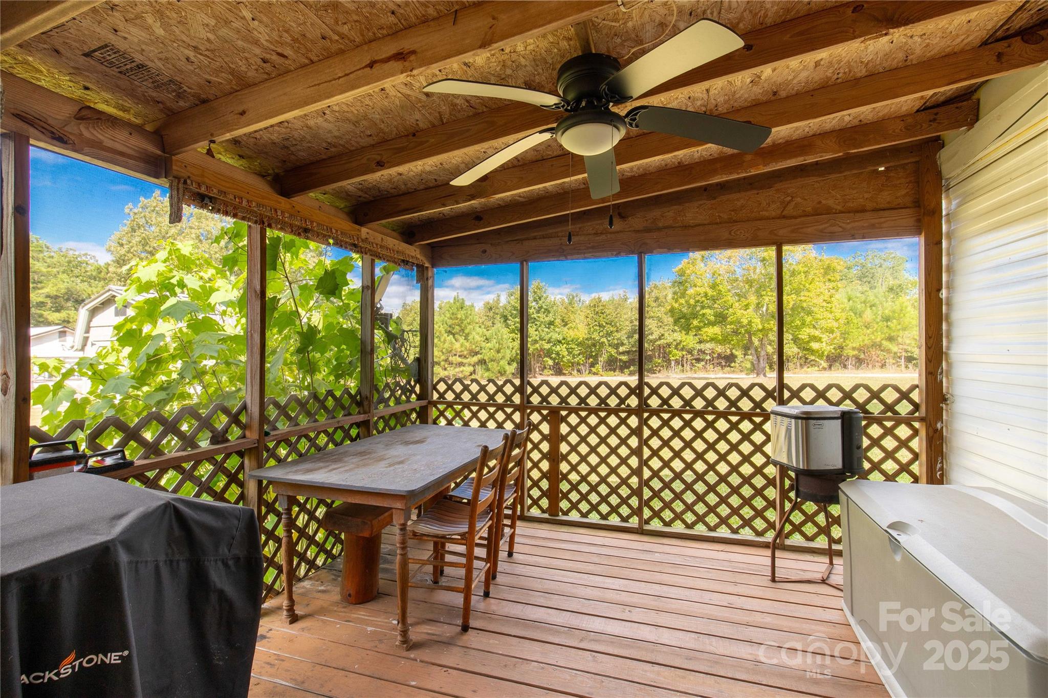 1164 Stroupe Road Lancaster, SC 29720 - Photo 37 of 37 a view of a porch with furniture and wooden floor
