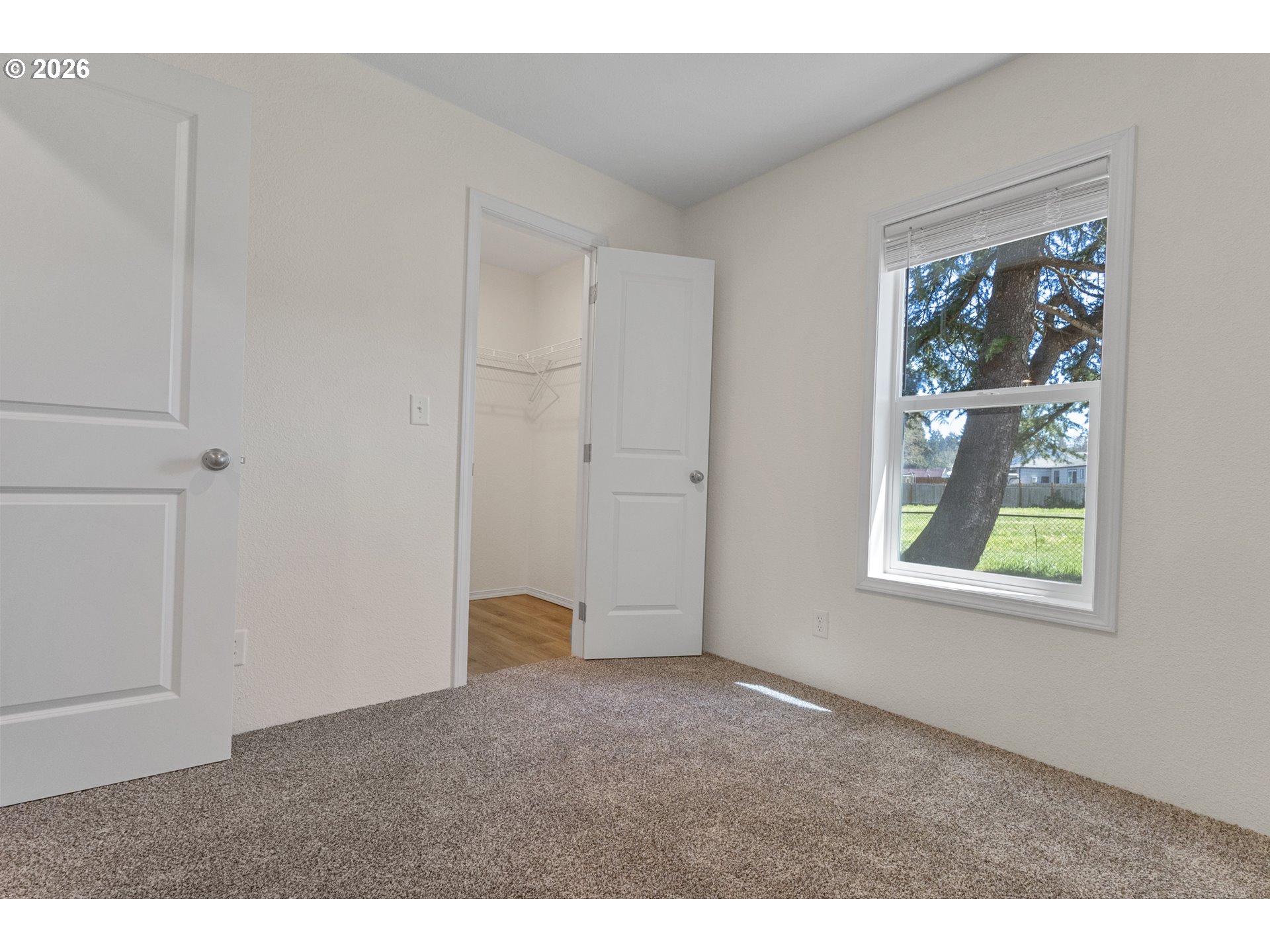 365 Mountain View Road Sweet Home, OR 97386 - Photo 16 of 32 a view of an empty room with a window