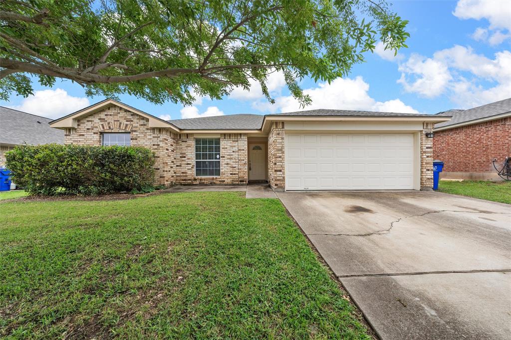10120 Salem Way Waco, TX 76708 - Photo 1 of 19 Ranch-style home with concrete driveway, a front yard, brick siding, a garage, and a shingled roof