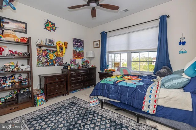 an aerial view of a house with a big yard