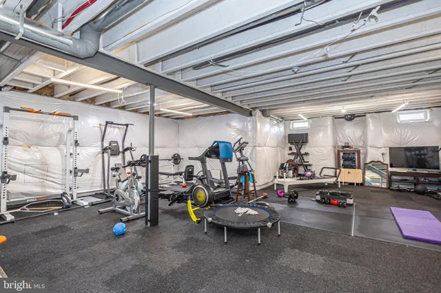 an aerial view of a house with outdoor space