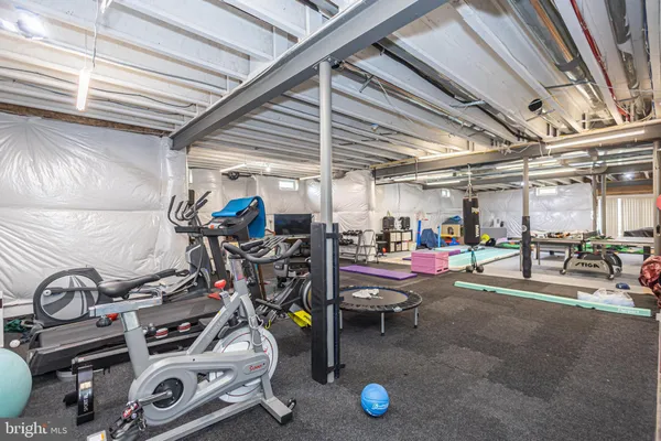an aerial view of a house with a ocean view