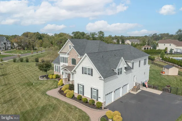a view of a lake with a yard