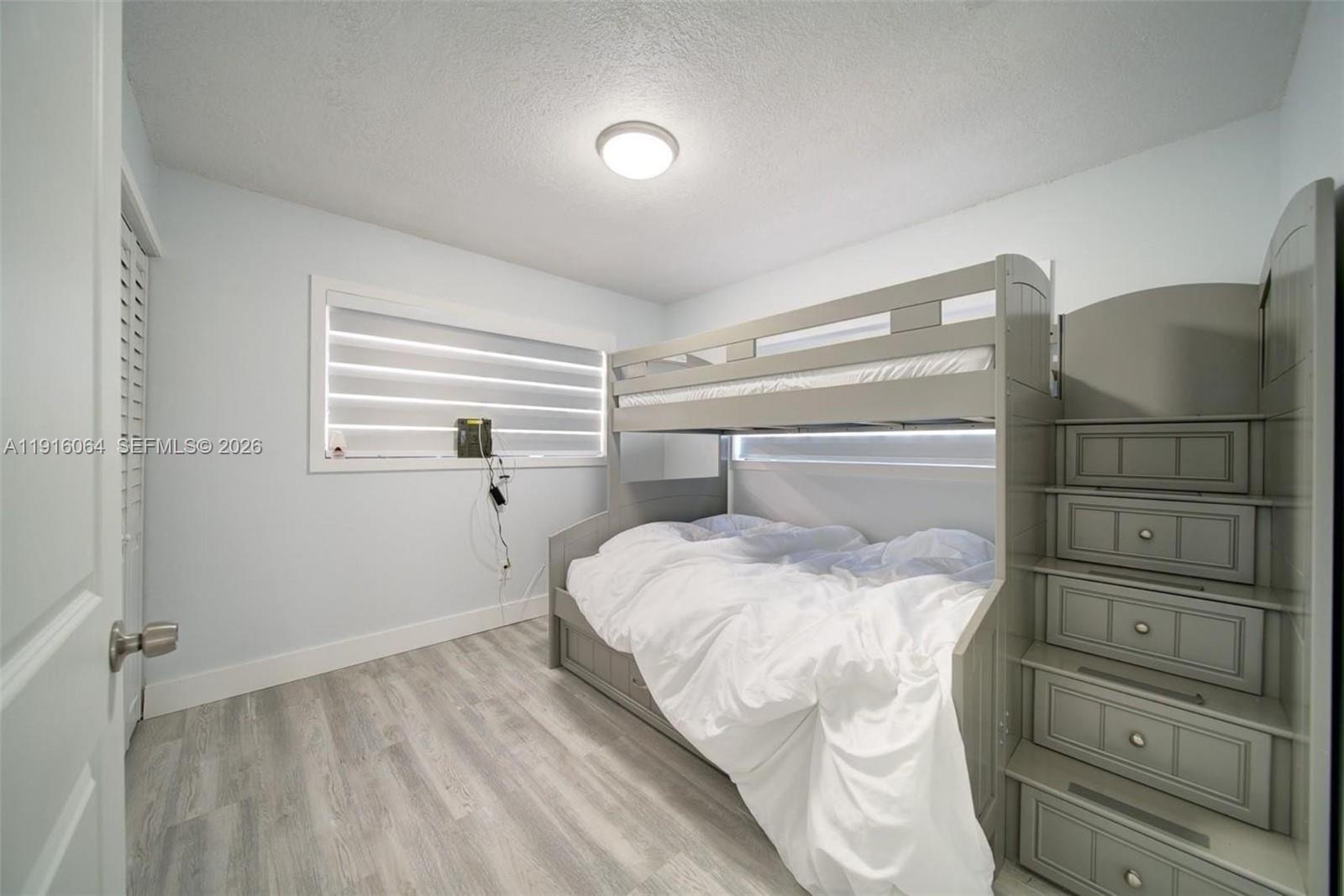 2 Snipe Road Key Largo, FL 33037 - Photo 19 of 45 a bedroom with a bed and a closet