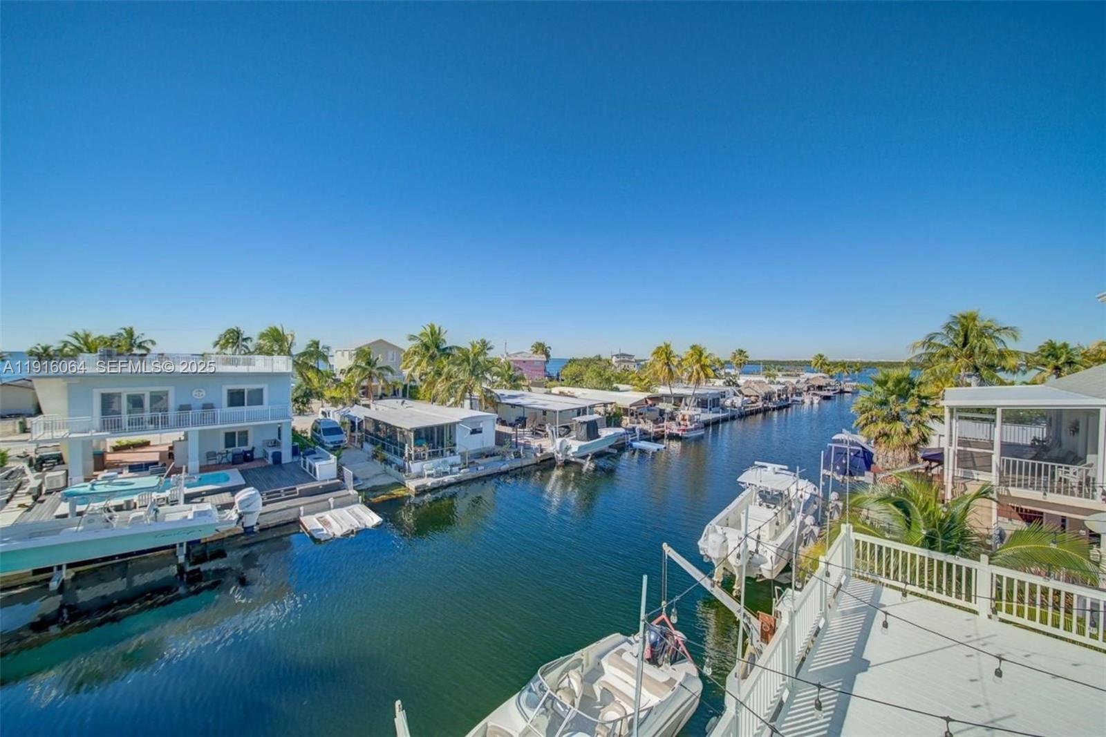 2 Snipe Road Key Largo, FL 33037 - Photo 34 of 41 a view of a balcony with chairs