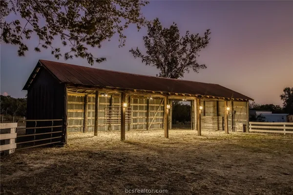 a front view of a house with a large window