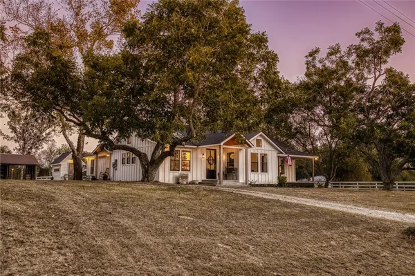 a view of house with a outdoor space