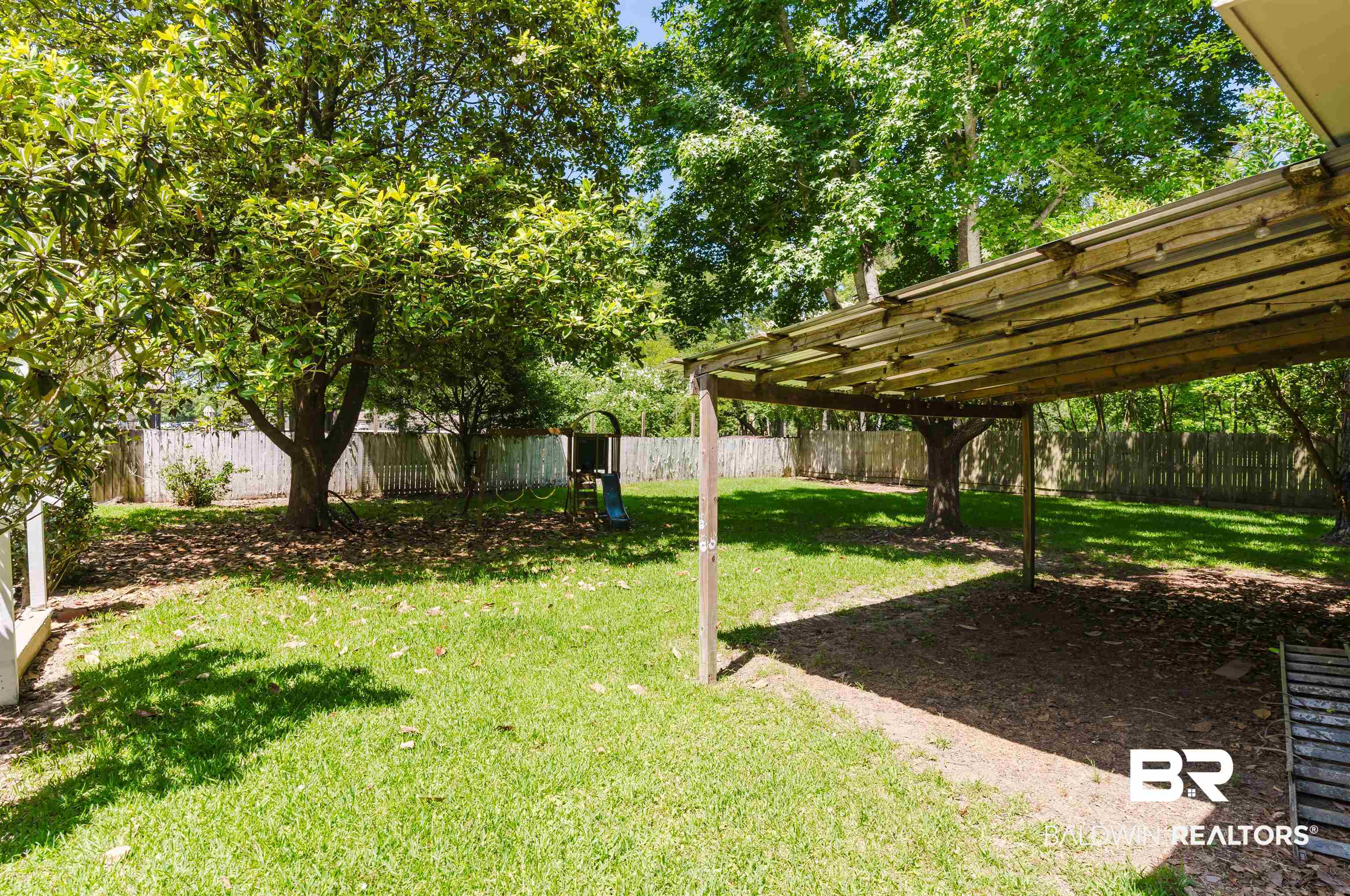 20460 Bishop Road Fairhope, AL 36532 - Photo 41 of 41 View of yard featuring a pergola