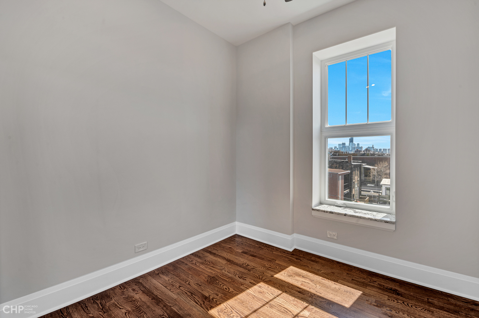 2100 North Halsted Street, Unit 4R Chicago, IL 60614 - Photo 11 of 26 a view of an empty room and window