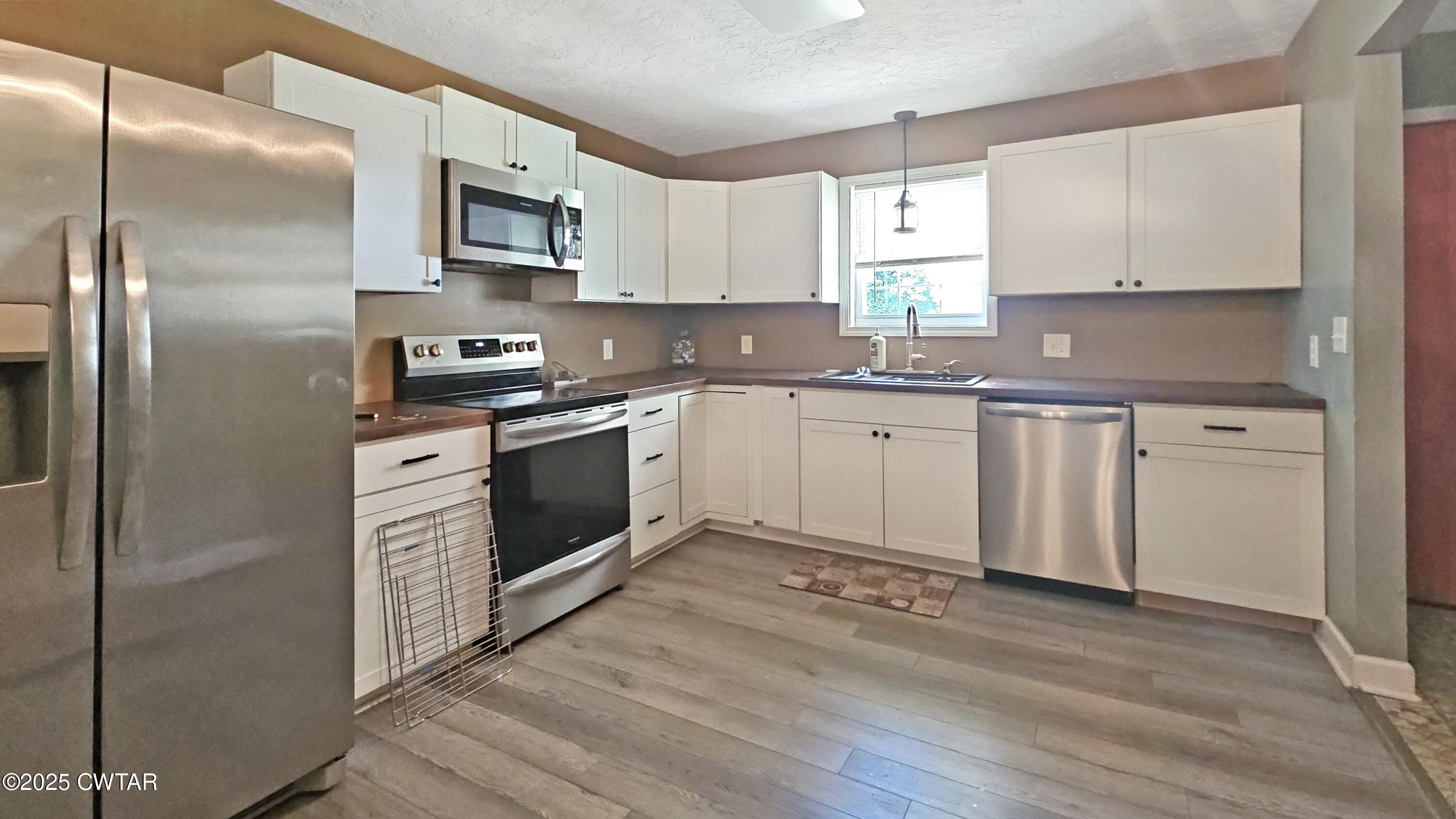 215 Front Street Trezevant, TN 38258 - Photo 4 of 18 6-Aug 27 2025 03_56am-xAjL