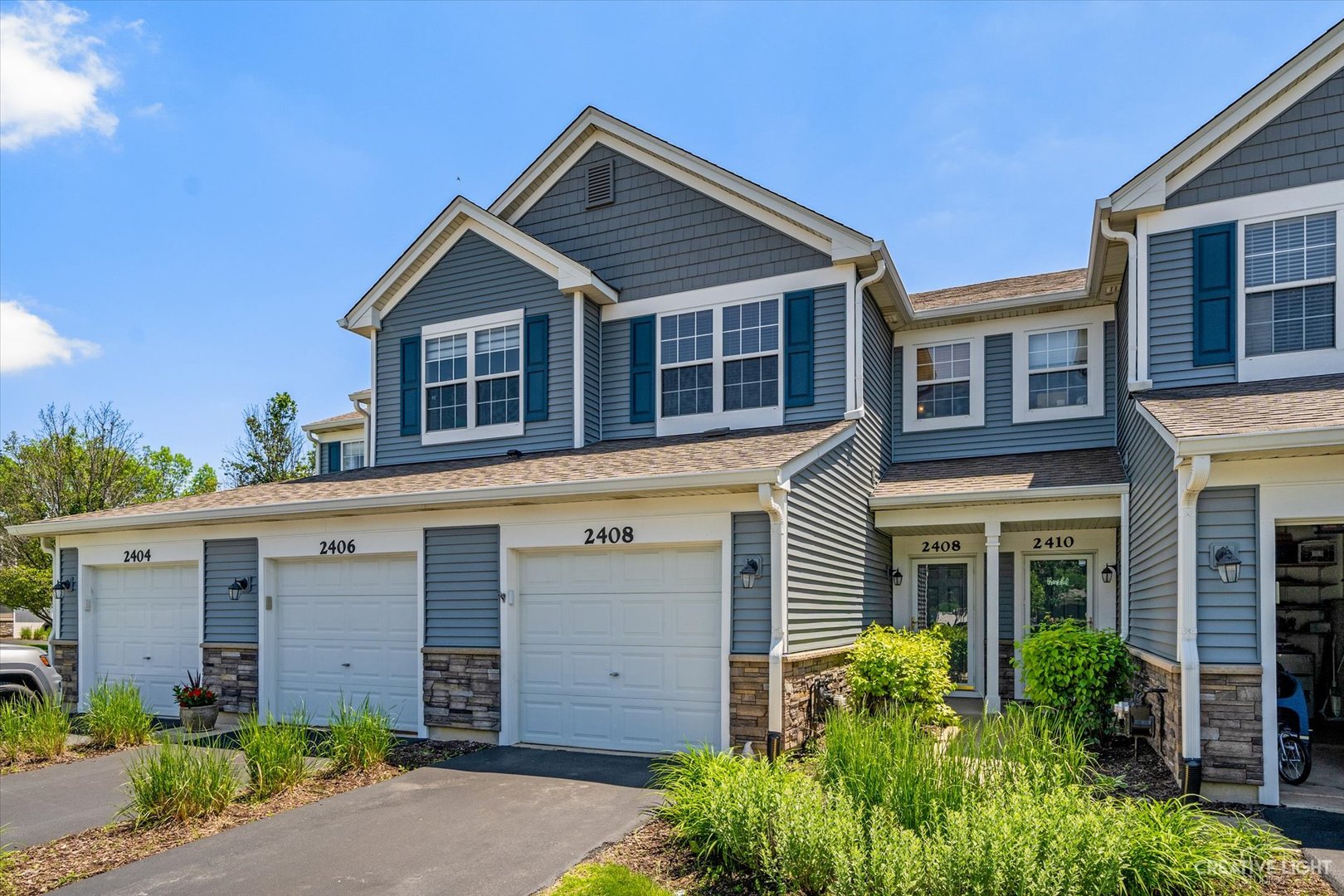 2408 Oneida Lane Naperville, IL 60563 - Photo 1 of 17 front view of a house with a small yard