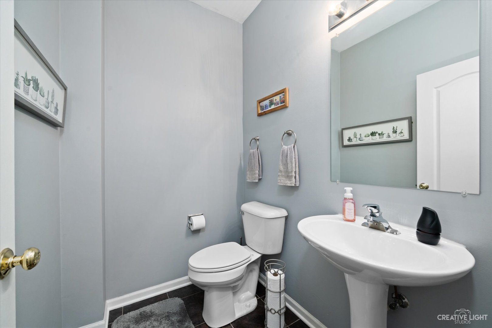 2408 Oneida Lane Naperville, IL 60563 - Photo 14 of 17 a bathroom with a toilet sink and mirror