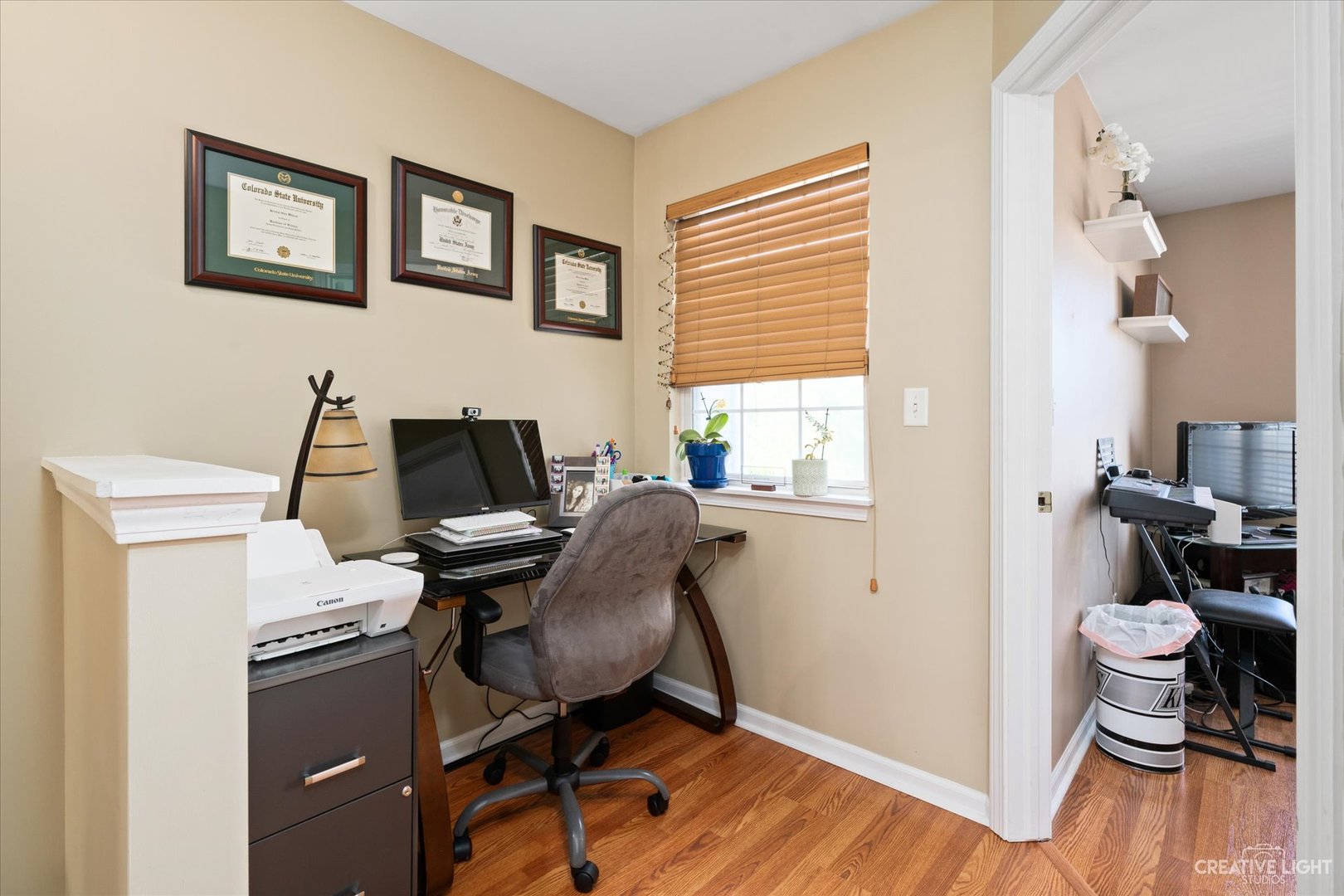 2408 Oneida Lane Naperville, IL 60563 - Photo 8 of 17 a view of a workspace with furniture and a window