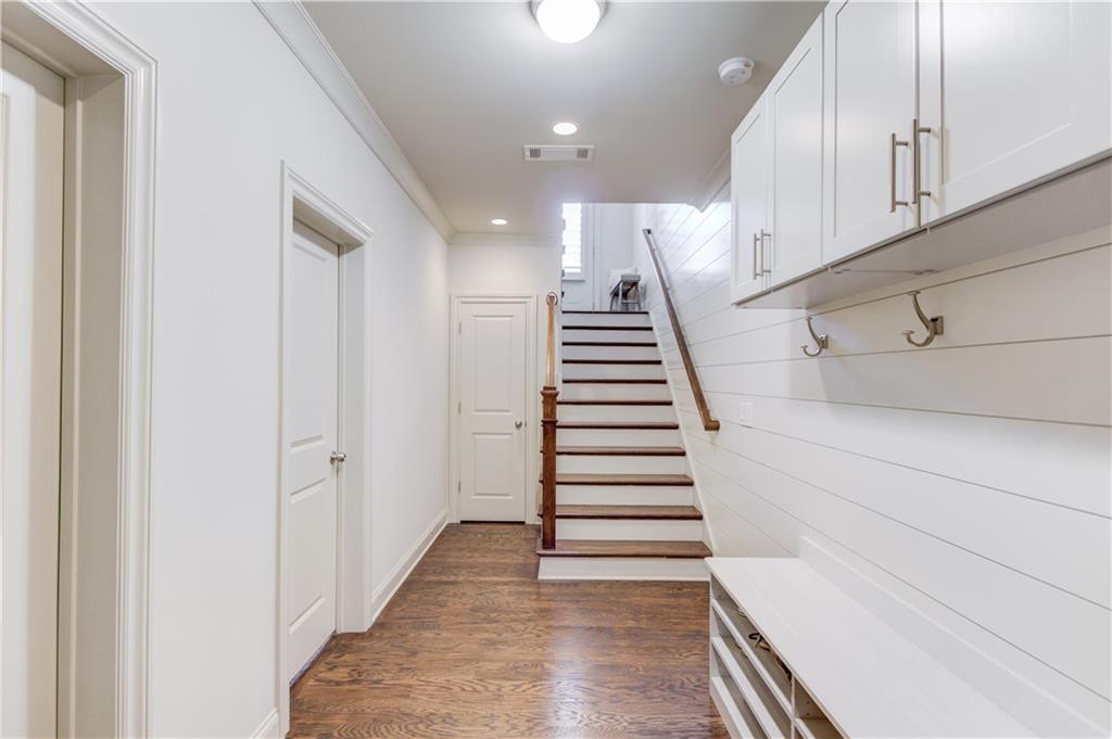 1816 Falling Sky Court Brookhaven, GA 30319 - Photo 35 of 44 a view of entryway and hall with wooden floor