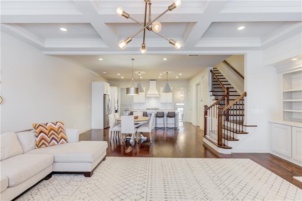 1816 Falling Sky Court Brookhaven, GA 30319 - Photo 5 of 44 a living room with furniture and wooden floor