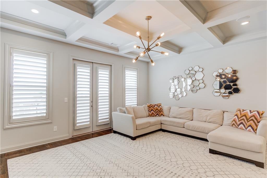 1816 Falling Sky Court Brookhaven, GA 30319 - Photo 8 of 44 a living room with furniture and a large window