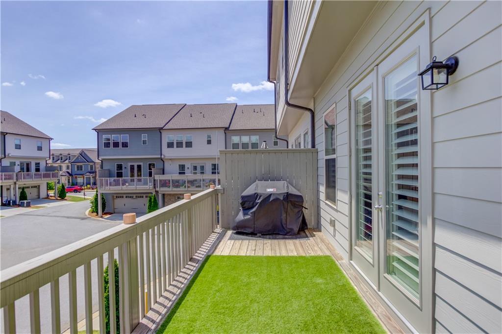 1816 Falling Sky Court Brookhaven, GA 30319 - Photo 9 of 44 a view of balcony and deck