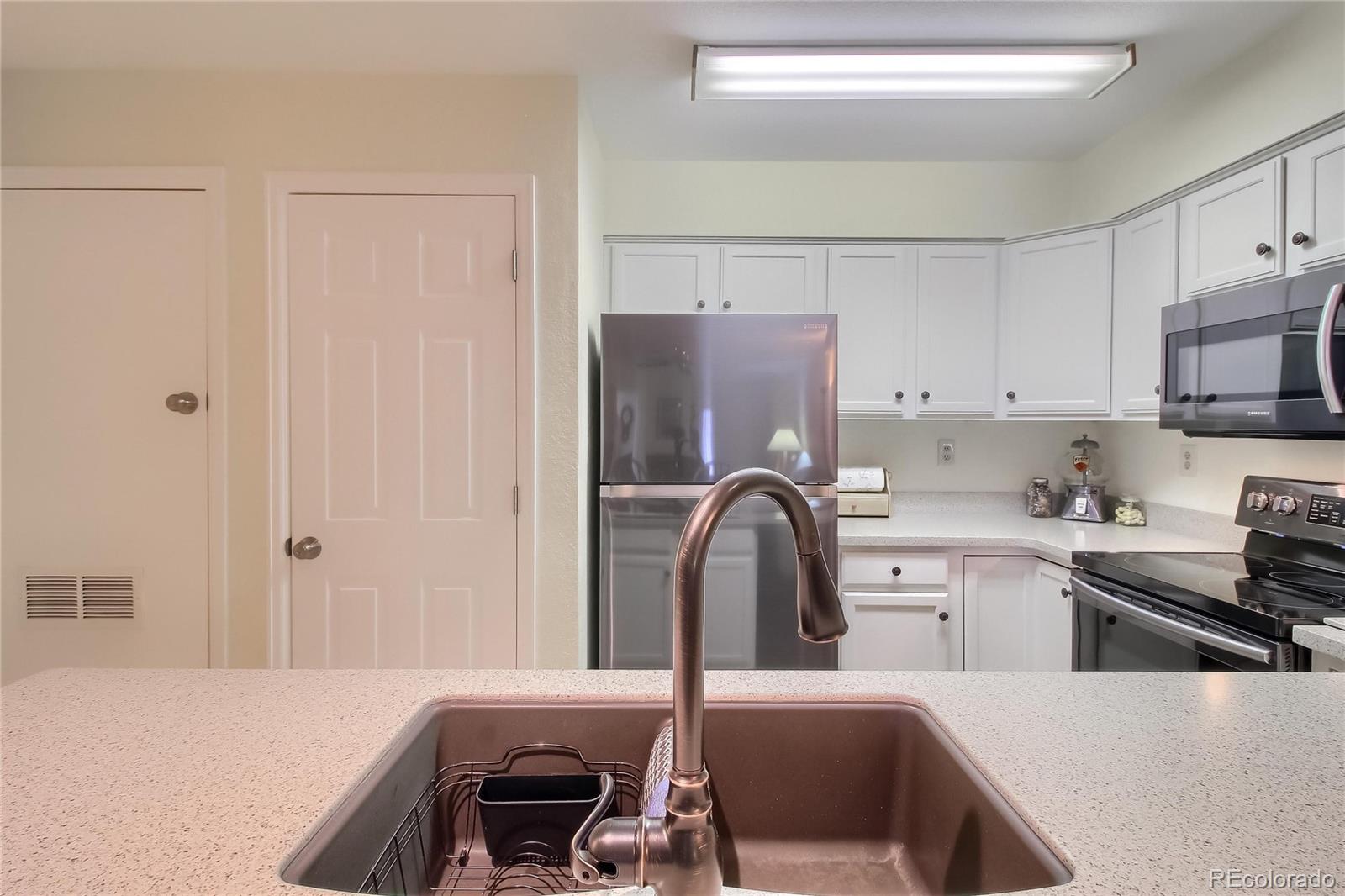 5071 Garrison Street, Unit 101B Wheat Ridge, CO 80033 - Photo 8 of 26 Gallery Image 8