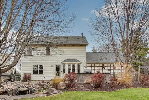 a front view of a house with a glass door